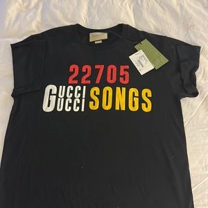 Gucci unisex shirt. Ex small true to size. Black yellow and red.